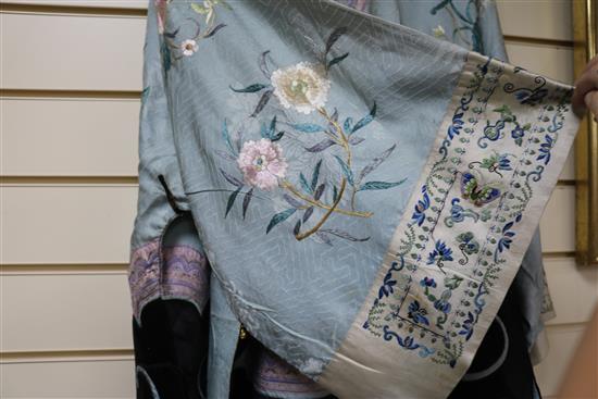 A Chinese embroidered silk robe, eau de nil ground, late Qing